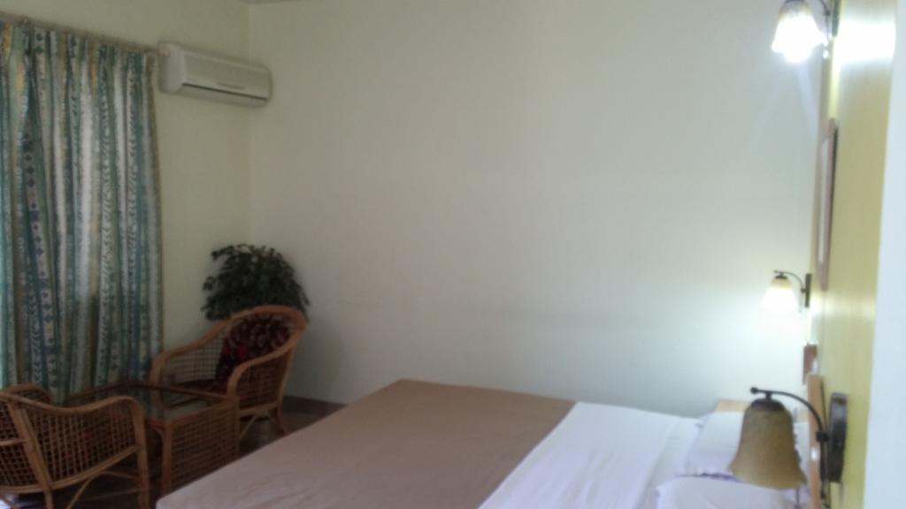 Tom'S Hotel Bangalore Bagian luar foto