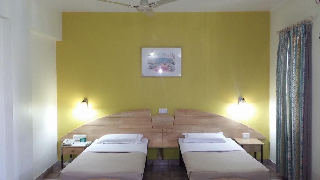 Tom'S Hotel Bangalore Ruang foto