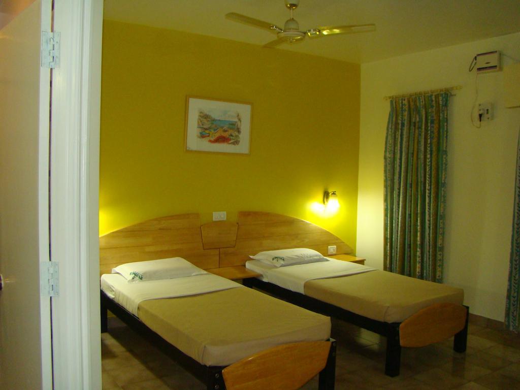 Tom'S Hotel Bangalore Ruang foto