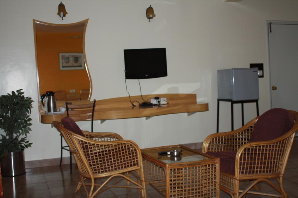 Tom'S Hotel Bangalore Bagian luar foto