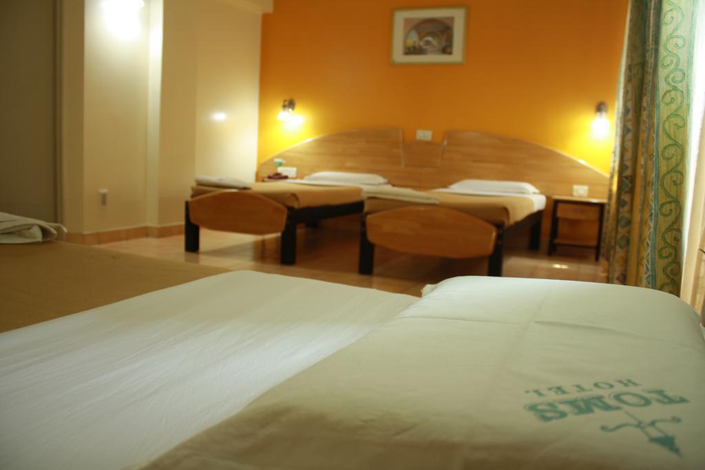 Tom'S Hotel Bangalore Bagian luar foto