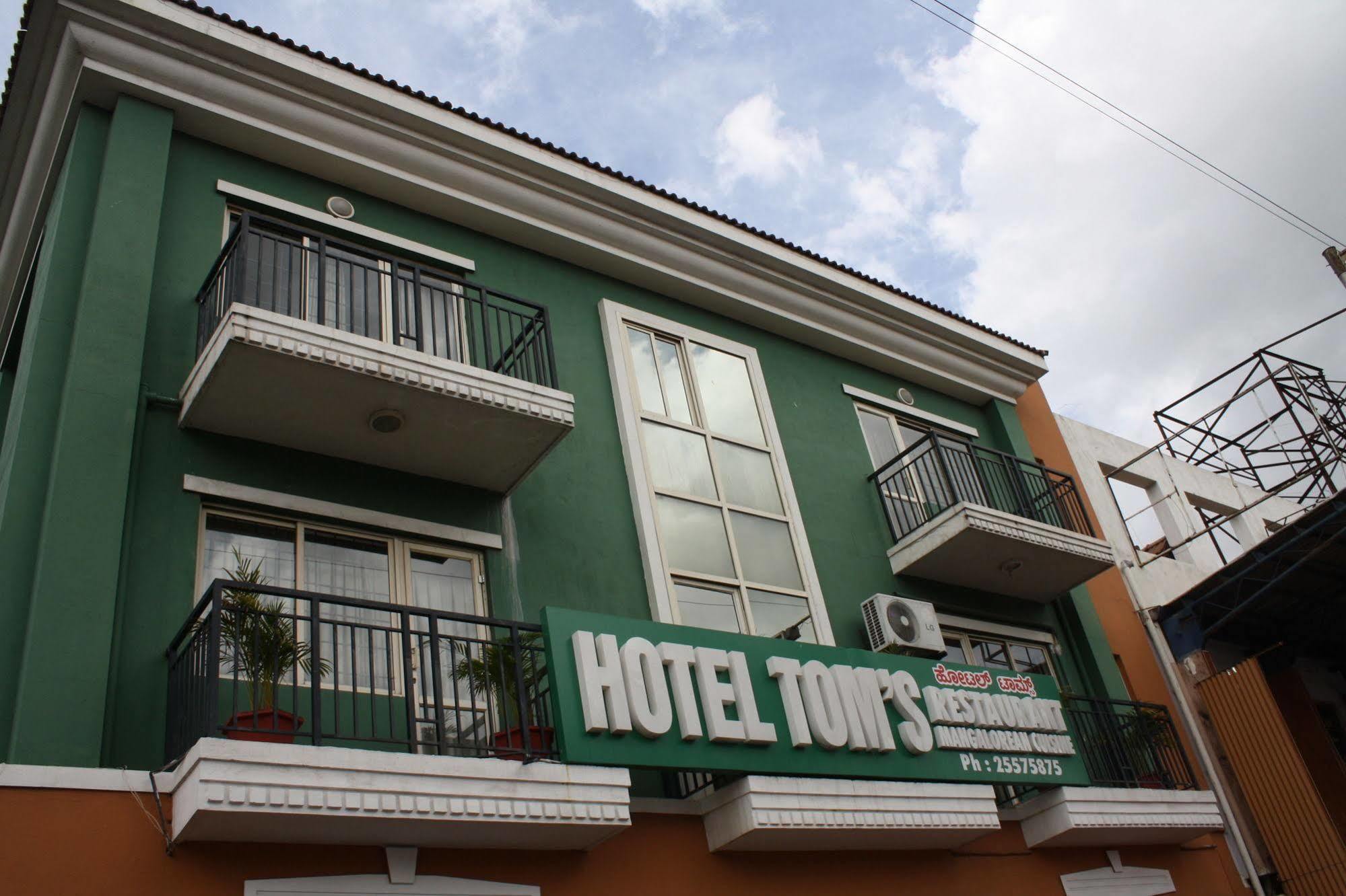 Tom'S Hotel Bangalore Bagian luar foto